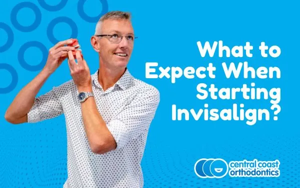 Banner reading What to Expect When Starting Invisalign, with an orthodontist holding an aligner